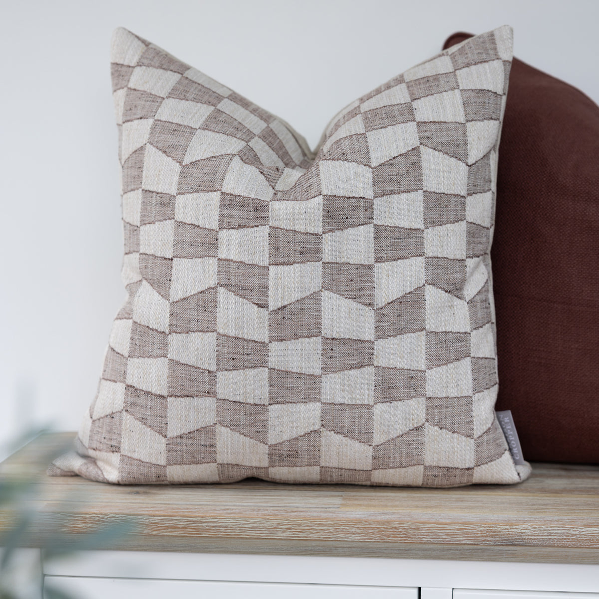 Ashbourne Auburn Brown Geometric Cushion with a cream and brown geometric check design
