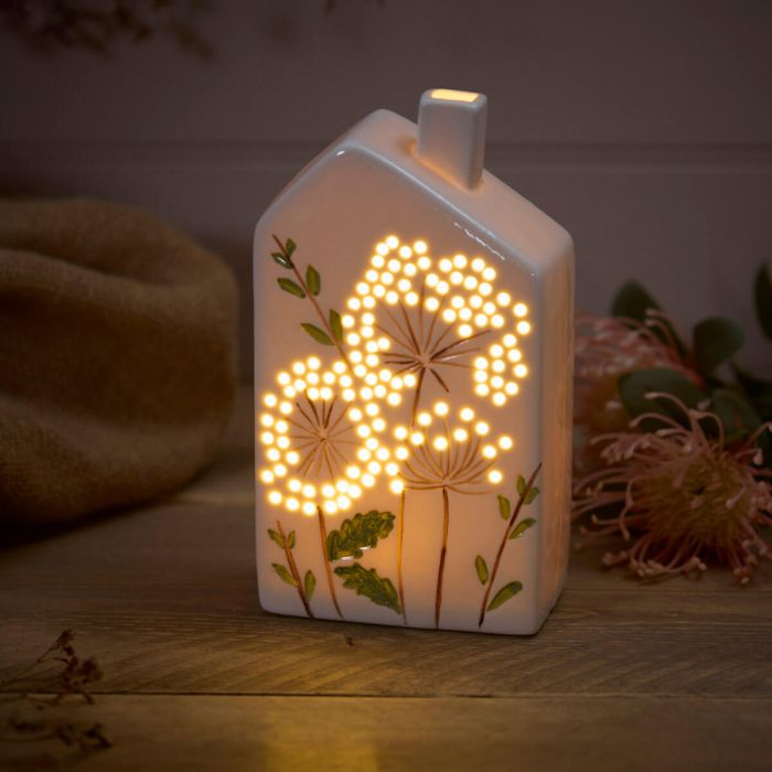 Ceramic LED Irregular Chimney House With Cut Out Flowers
