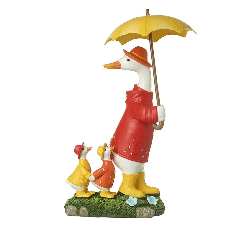 Duck Family Under Umbrella