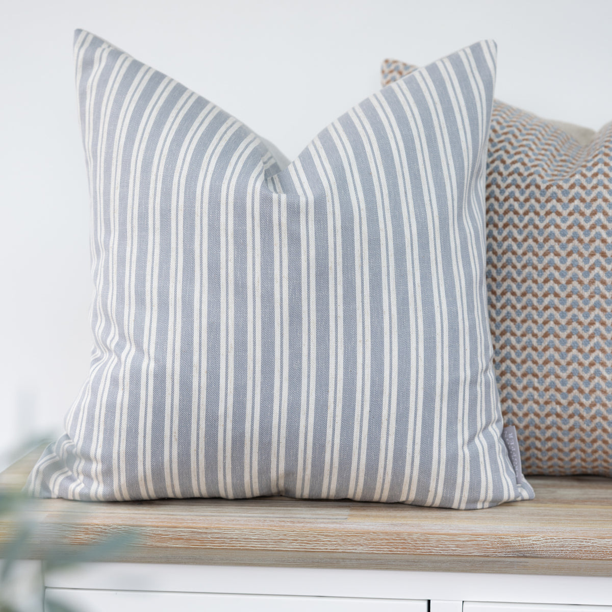 Alderton Cornflower Blue Stripe Cushion with narrow cream vertical stripes