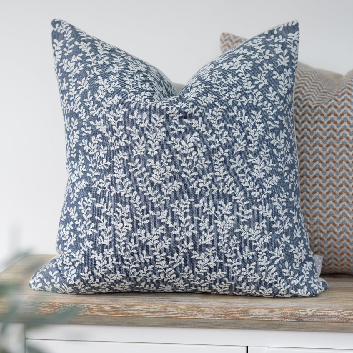 Wychwood Indigo Blue Leaf Cushion with trailing cream leaves
