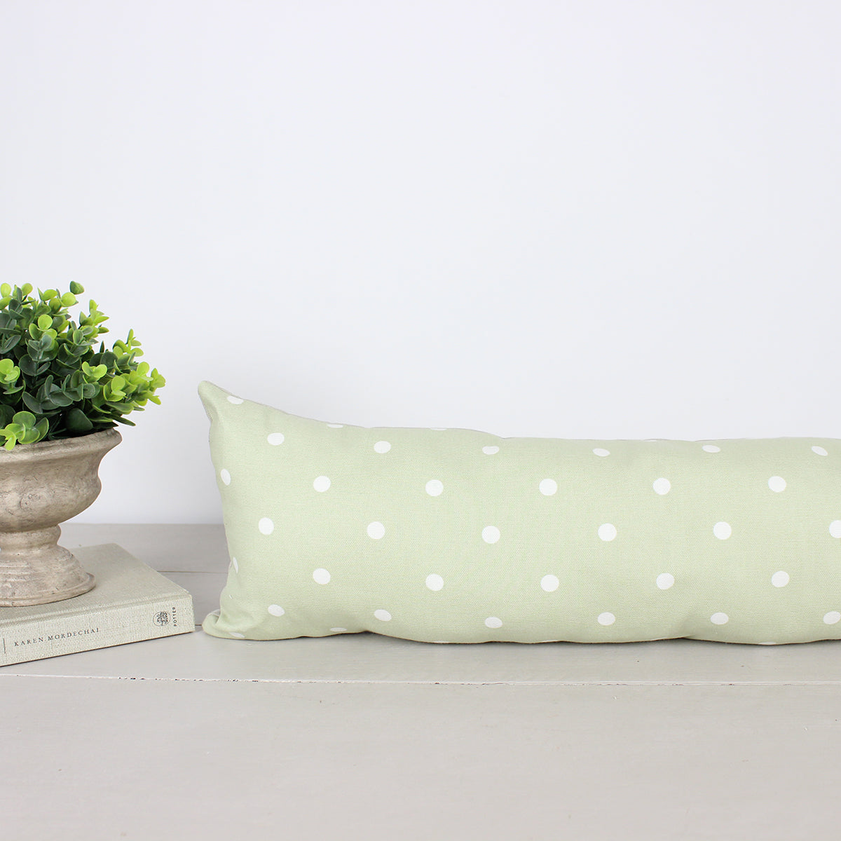 Dotty Sage Green Draught Excluder